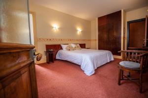 Letto o letti in una camera di Hôtel Terminus