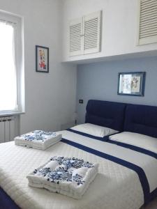 A bed or beds in a room at appartamento Chiara