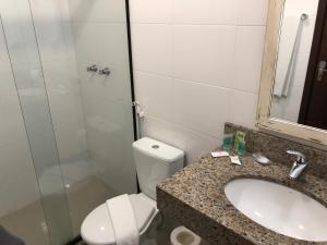 Um banheiro em Pousada Rosa