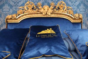 A bed or beds in a room at La Casa Sul Nilo