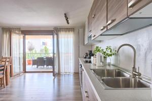 مطبخ أو مطبخ صغير في Apartment Peninsula