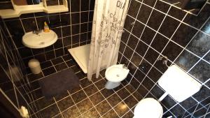 Ein Badezimmer in der Unterkunft Apartmani Laura