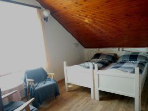 Posteľ alebo postele v izbe v ubytovaní Anna Hunor + 4 fotografie