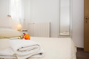 Posteľ alebo postele v izbe v ubytovaní Apartments Cekada