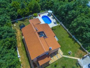 an overhead view of a house with a swimming pool at Holiday Home Villa Lucia in Vodnjan