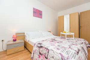 Posteľ alebo postele v izbe v ubytovaní Apartments Cekada