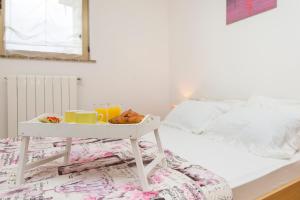 Posteľ alebo postele v izbe v ubytovaní Apartments Cekada