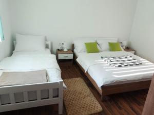 Postel nebo postele na pokoji v ubytování Apartman Sara vl. Franjo Klasić