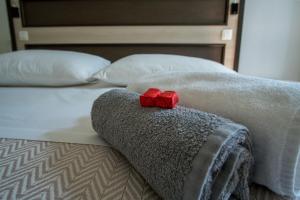 Postel nebo postele na pokoji v ubytování JR Luxury Guesthouse