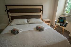 Postel nebo postele na pokoji v ubytování JR Luxury Guesthouse