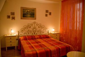 Voodi või voodid majutusasutuse B&B Vecchia Alghero toas