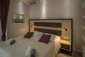 Postel nebo postele na pokoji v ubytování JR Luxury Guesthouse