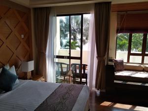 เตียงในห้องที่ Langkawi Lagoon Resort Seaview