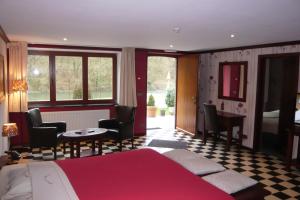 Postel nebo postele na pokoji v ubytování Hôtel/Restaurant à la Ferme