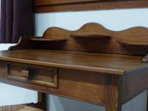 a wooden desk with a wooden drawer at Maison d'Hôtes Zella in Bains de Guitera