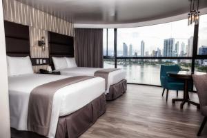 Cama ou camas em um quarto em Plaza Paitilla Inn