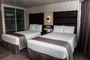 Cama ou camas em um quarto em Plaza Paitilla Inn