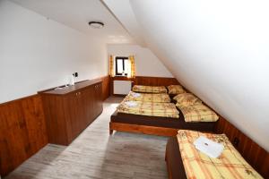 Postel nebo postele na pokoji v ubytování Chalupa Chlum Jiřík