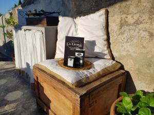 a bed with a box on top of it at Villa Eugenia in Livorno