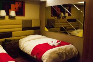 Katil atau katil-katil dalam bilik di Hotel Royal Qosqo