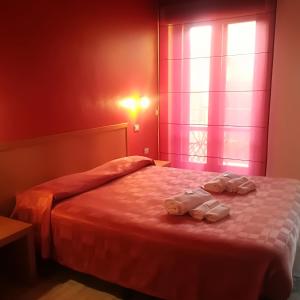Postel nebo postele na pokoji v ubytování Hotel I Colori