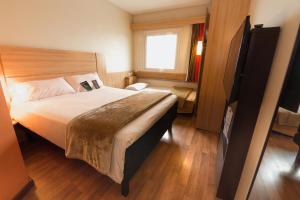 Letto o letti in una camera di ibis Concepcion