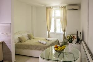 Ένα ή περισσότερα κρεβάτια σε δωμάτιο στο Natalie's Apartment