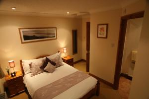 Katil atau katil-katil dalam bilik di Anvil View Guest House