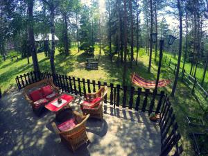 an overhead view of a patio with chairs and a table at Ethno Cottage "Biljana" in Zlatibor