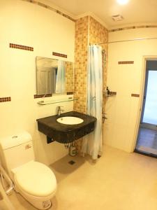 Un baño de Dong-Qing Swiss Homestay