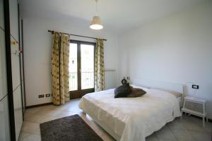 Postel nebo postele na pokoji v ubytování Casa Bùri