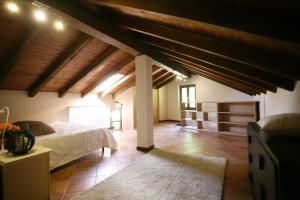 Postel nebo postele na pokoji v ubytování Casa Bùri