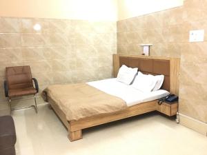 Gulta vai gultas numurā naktsmītnē Nalanda Hotel