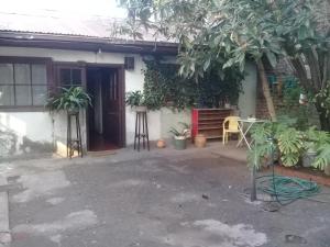 a house with plants in front of it at Doña Irene B & B in Rancagua