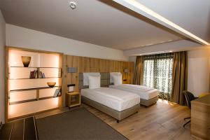 Voodi või voodid majutusasutuse Trüffel Hotel toas