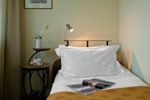 Cama ou camas em um quarto em Best Western Vilnius