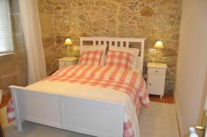 Ένα ή περισσότερα κρεβάτια σε δωμάτιο στο Casa tía Amparo