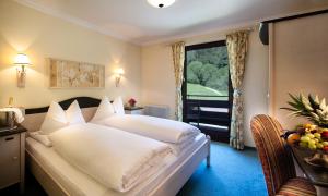 Krevet ili kreveti u jedinici u okviru objekta Hotel Seewinkel