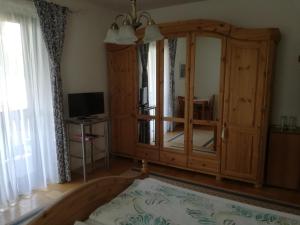 Postel nebo postele na pokoji v ubytování Gästehaus Schleich