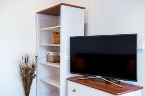 TV a/nebo společenská místnost v ubytování Apartmány Tina a Zdenka - Stožec
