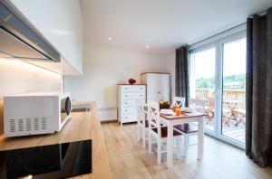 Kuchyň nebo kuchyňský kout v ubytování Apartmány Tina a Zdenka - Stožec