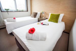 Postel nebo postele na pokoji v ubytování Tamo