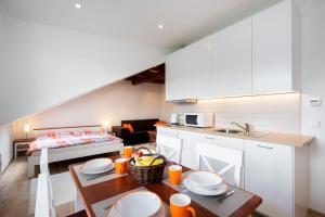 Kuchyň nebo kuchyňský kout v ubytování Apartmány Tina a Zdenka - Stožec