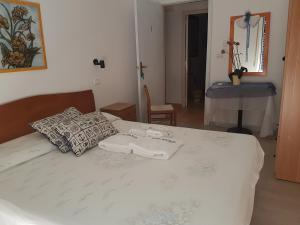 Кровать или кровати в номере B&B Miramare
