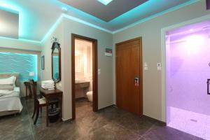 Postel nebo postele na pokoji v ubytování Hotel Mallas