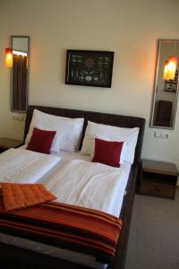 Posteľ alebo postele v izbe v ubytovaní Hotel Al Faro Lodge am See