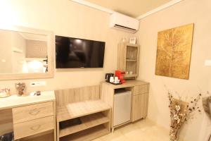 Kuchyň nebo kuchyňský kout v ubytování Hotel Mallas