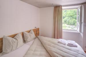 Voodi või voodid majutusasutuse MyVerzasca Resort Ai piee toas