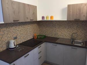 Kuchyňa alebo kuchynka v ubytovaní Villa Giò