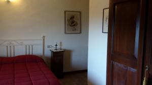 Posteľ alebo postele v izbe v ubytovaní Podere Il Caggio Rooms